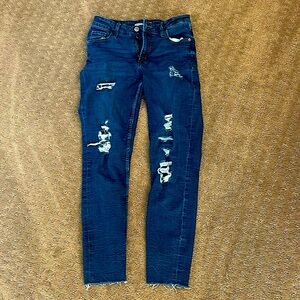 Blue skinny ripped jeans